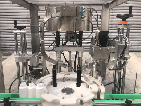 塑料瓶蓋旋蓋機-全自動灌裝塑料瓶旋蓋機生產(chǎn)線